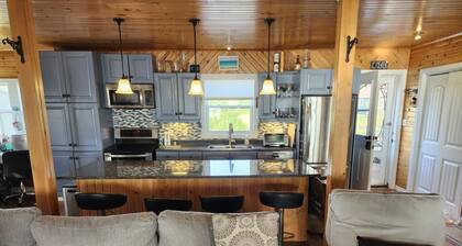 Blooming Point home on Tracadie Bay with sunset views of the National Park Dunes