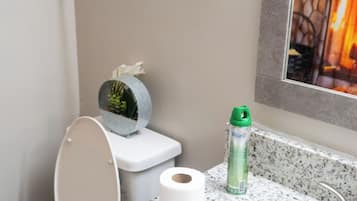 Shower, towels, soap, toilet paper