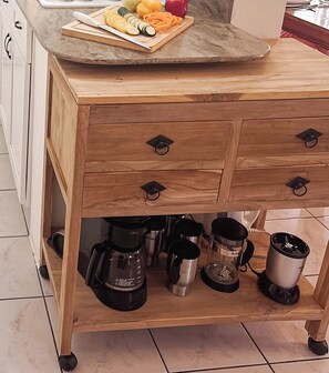 Fridge, microwave, stovetop, coffee/tea maker