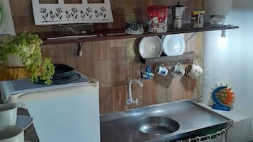 Full-size fridge, cookware/dishes/utensils, freezer