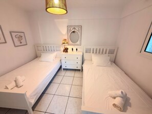 2 chambres, fer et planche à repasser, Wi-Fi, draps fournis