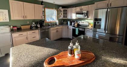 4-bedroom house on DeRuyter Lake with WiFi, Fitness room, AC and Hot Tub!