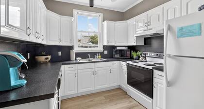 2 bed/2.5 bath upstairs Unit - Walk to the Beach!