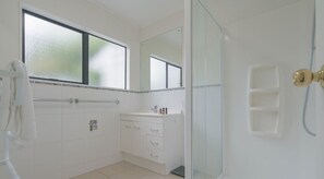 Hair dryer, towels - Seaside Oasis Haven | by Furnished Rentals (Auckland)