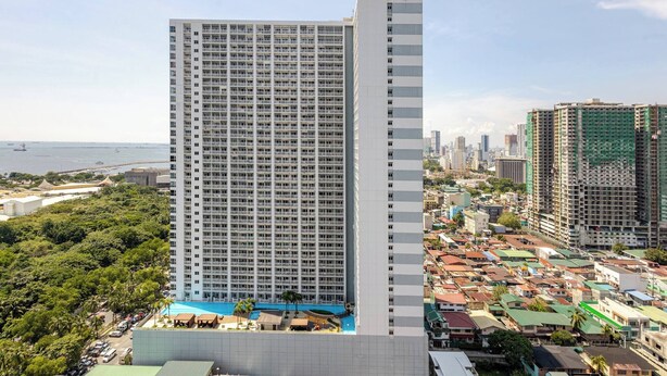 Condo, 1 Bedroom, Balcony, City View | Exterior - J5 Bayview Elegant Retreat With Stunning Views (Pasay)