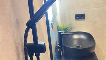 Hair dryer, towels, soap, toilet paper