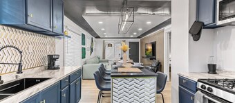 Modern oasis W/ Game room/fenced yard-smoke room- Fits 16+ guests.