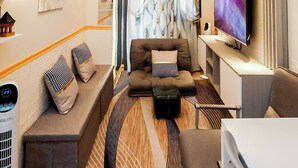 Condo, 1 Bedroom, Balcony, Pool View | Living room - Sapphira Manor Luxurious Condo by the Bay (Pasay)