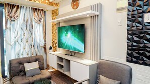 Condo, 1 Bedroom, Balcony, Pool View | Living room - Sapphira Manor Luxurious Condo by the Bay (Pasay)