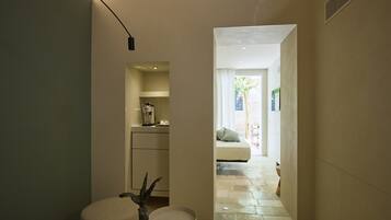 Deluxe Room, 1 Queen Bed, Garden View | Living area | 42-inch Smart TV with digital channels