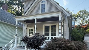 A two-story house with a front porch, a staircase, and a mailbox. - Charming 2-bedroom 2 1/2 bath House with WiFi and AC in fabulous Cincinnati (Cincinnati)