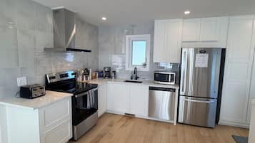 Microwave, stovetop, dishwasher, coffee/tea maker