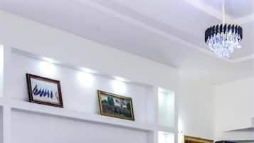 Departamento, 1 habitación, para fumadores, alberca privada | Sala de estar