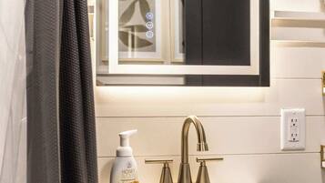 Hair dryer, towels, soap, shampoo