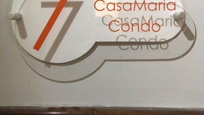 A sign with the number 7 and the text "CasaMaria Condo" on a wall. - CasaCondo on Golden Mile - Twin Apartments by UNESCO Wonders for Large Groups (Torre del Greco)