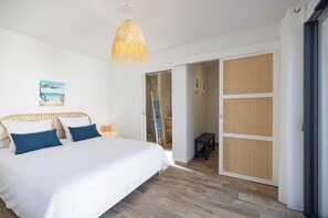 Iron/ironing board, travel crib, free WiFi, bed sheets
