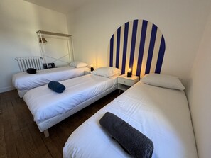 Departamento | 2 habitaciones y tabla de planchar con plancha 