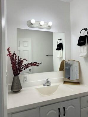 Hair dryer, towels, soap, toilet paper
