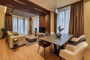 Luxury Apartment, Lanai, City View | Living area | TV - Queen's Park Residence Apartments (Belgrade)