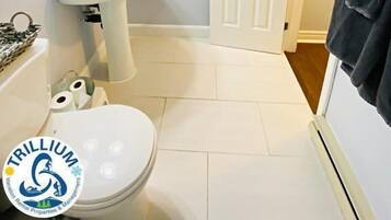 Standard Apartment, 2 Bedrooms, Balcony, Garden View | Bathroom | Combined shower/bathtub, hair dryer, towels, soap