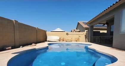 Spacious 4-bedroom house in welcoming Goodyear with Dual AC and Pool