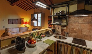 Fridge, microwave, stovetop, coffee/tea maker