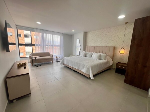 1 chambre, fer et planche à repasser, draps fournis