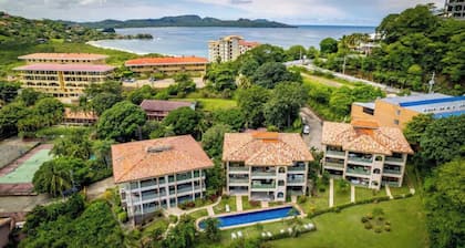 Elegant Condo with Brand-New Fixtures, Shaded Tropical Terrace, and Secluded Beach Access