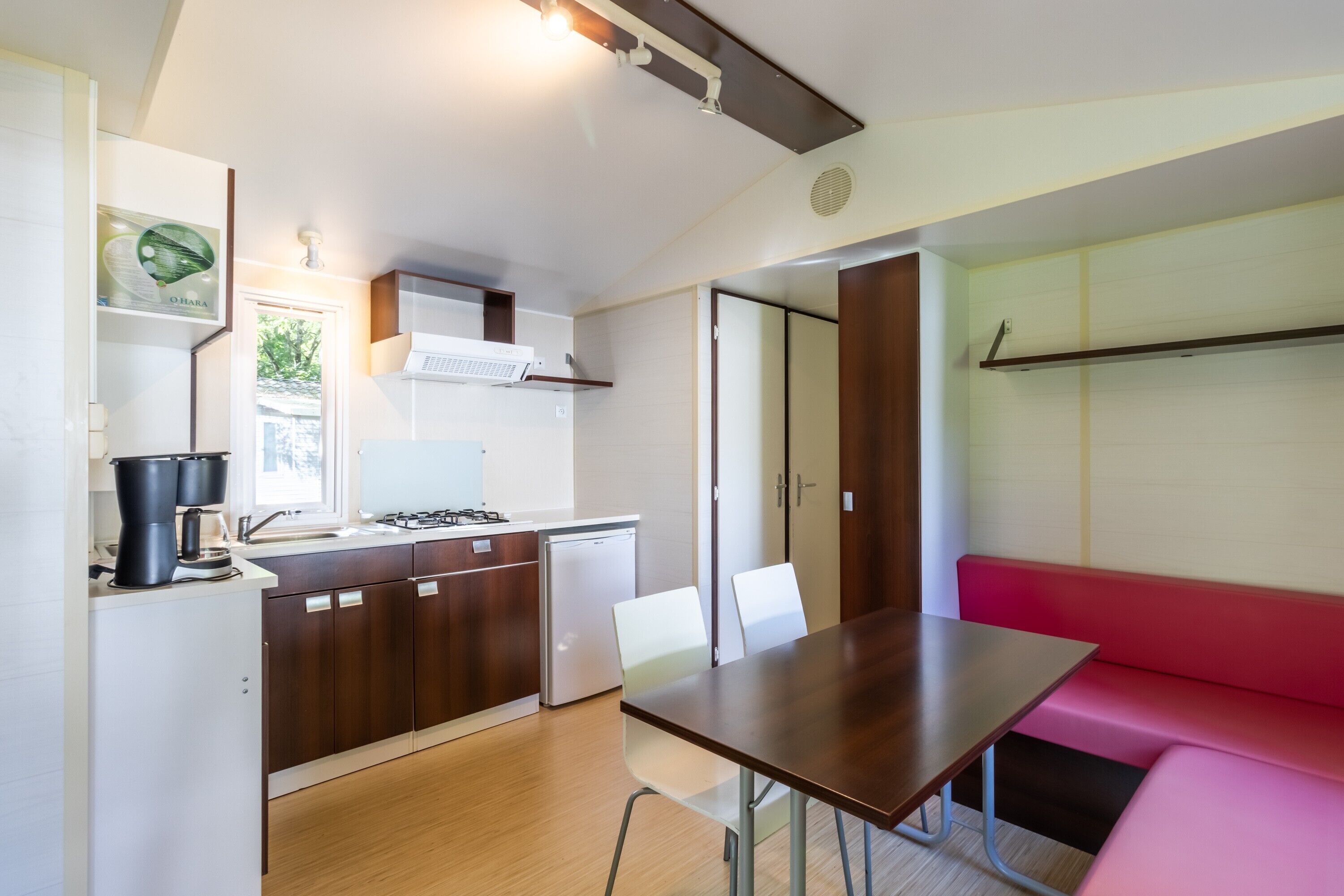 Fridge, microwave, stovetop, coffee/tea maker