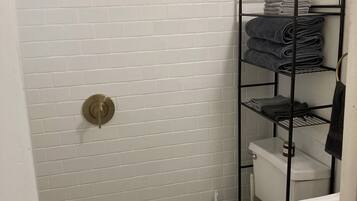 Shower, towels, soap, shampoo