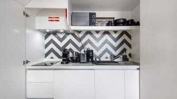 Microwave, stovetop, coffee/tea maker, electric kettle