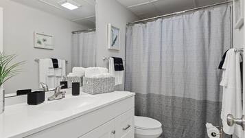 Hair dryer, towels, soap, shampoo