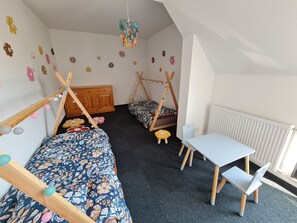 Iron/ironing board, travel crib, free WiFi, bed sheets