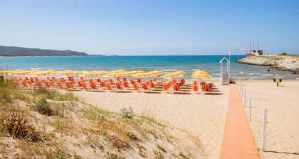 Property in the holiday village 'Baia Falcone - Standard 204' with sea view and air conditioning