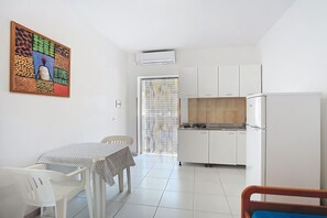 Fridge, stovetop, cookware/dishes/utensils