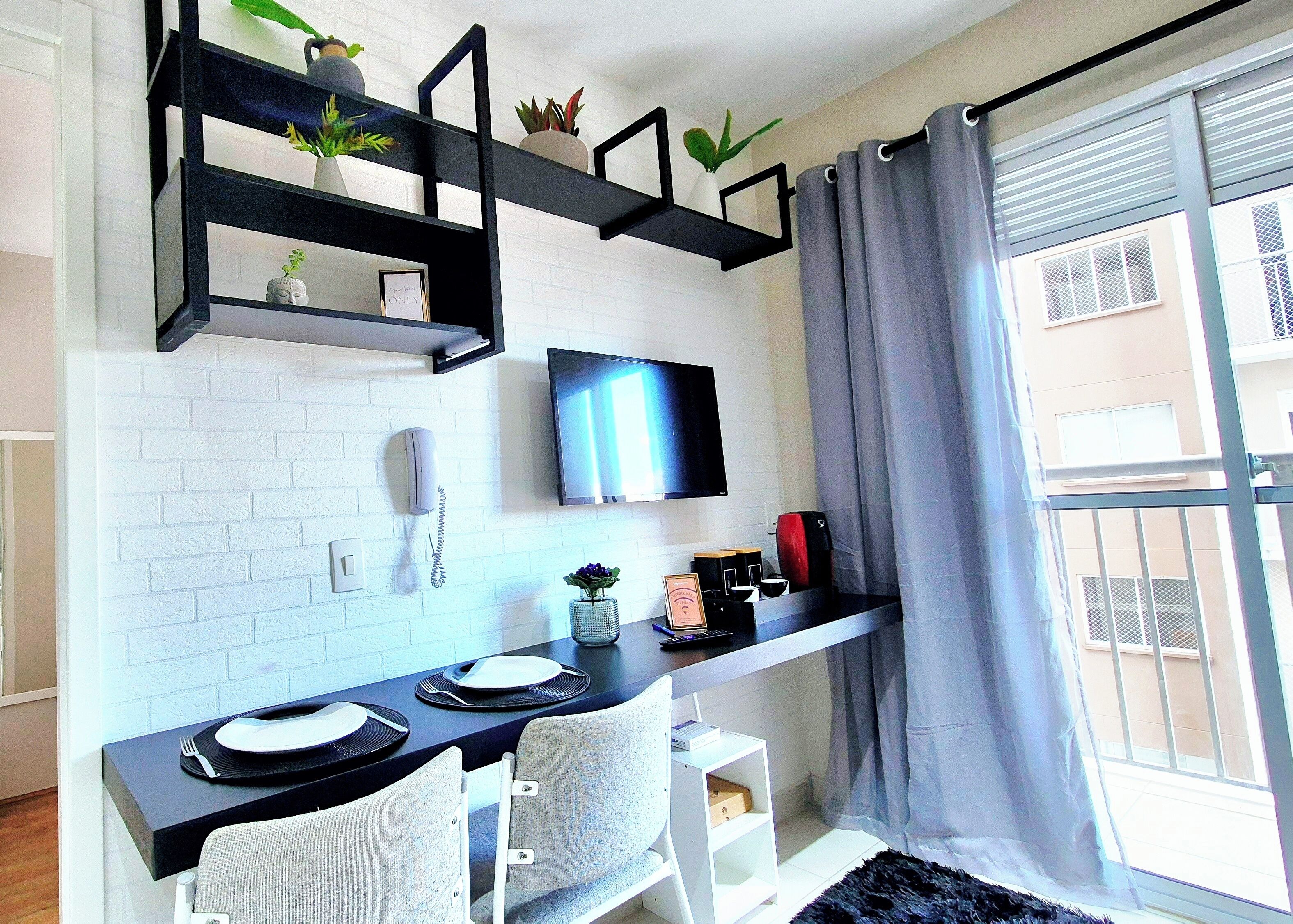 Apartamento standard, varanda coberta | Área de estar