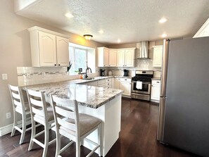 Fridge, microwave, oven, stovetop - Spacious Gathering Place 2x Living Rooms & Dining Rooms + Fenced Private Yard (South Jordan)