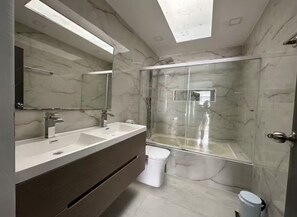 Shower, hair dryer, towels, soap