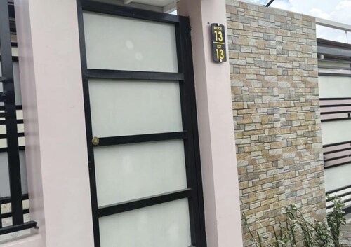 Charming 2-bedroom bungalow with WiFi, AC in awesome General Santos City