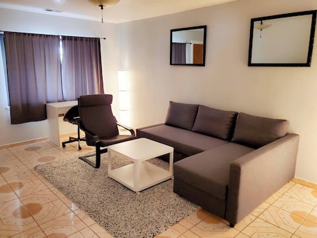 Living area. Charming 1-bedroom house with AC, WiFi in delightful San Bruno