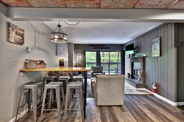 Breakfast works well at the bar, with the living room just a few steps away.