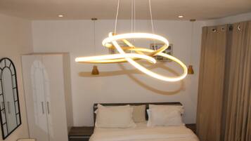 Deluxe Studio Suite, Balcony, City View | Laptop workspace, free WiFi