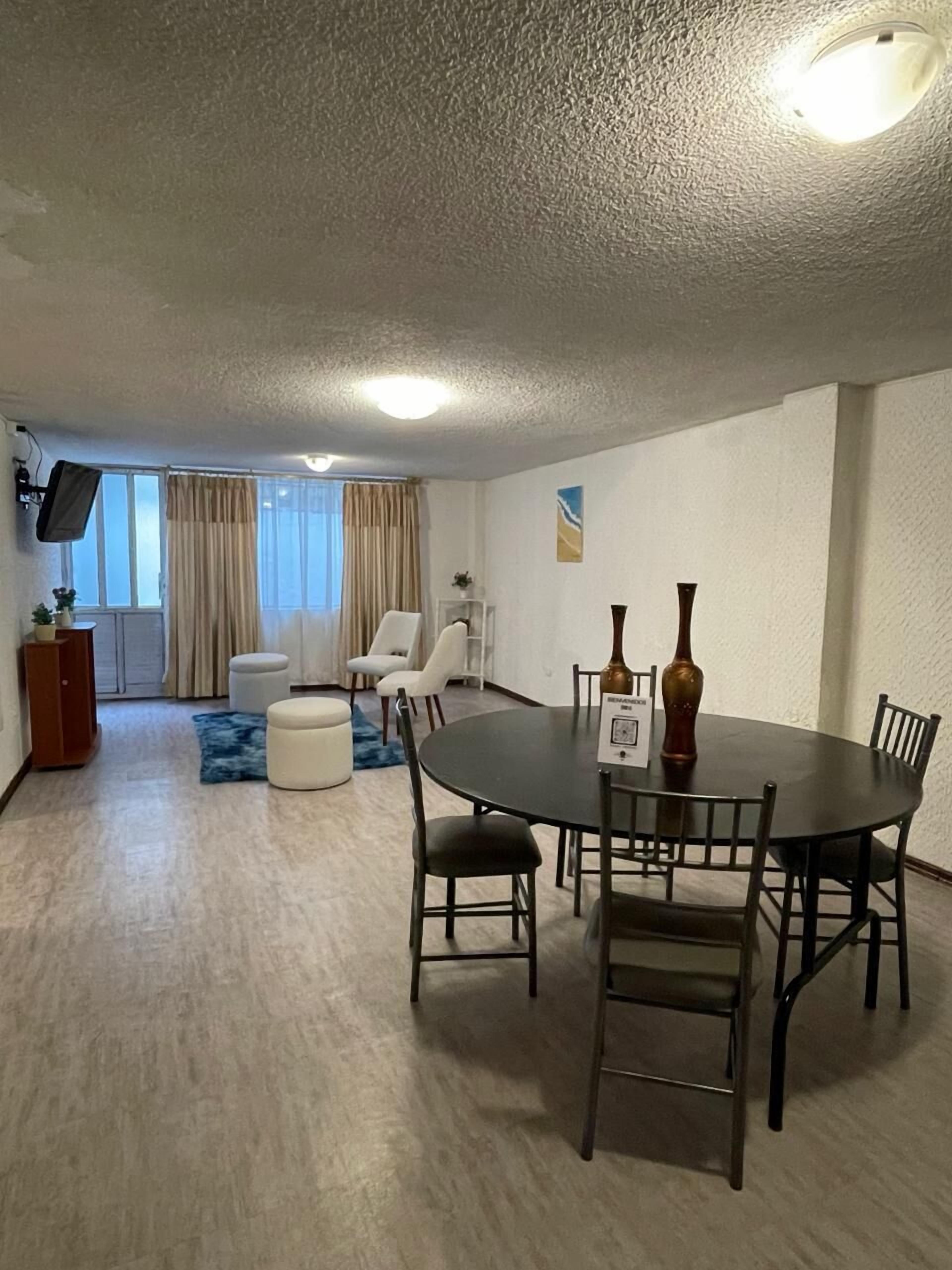 Chambre Majestueuse | Coin séjour