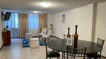 Chambre Majestueuse | Coin séjour