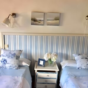 4 slaapkamers, een strijkplank/strijkijzer, gratis wifi, beddengoed