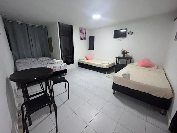 Basic Quadruple Room, Patio | Free WiFi
