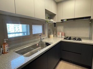 Fridge, microwave, electric kettle, toaster