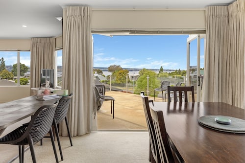 Lake house with panoramic view