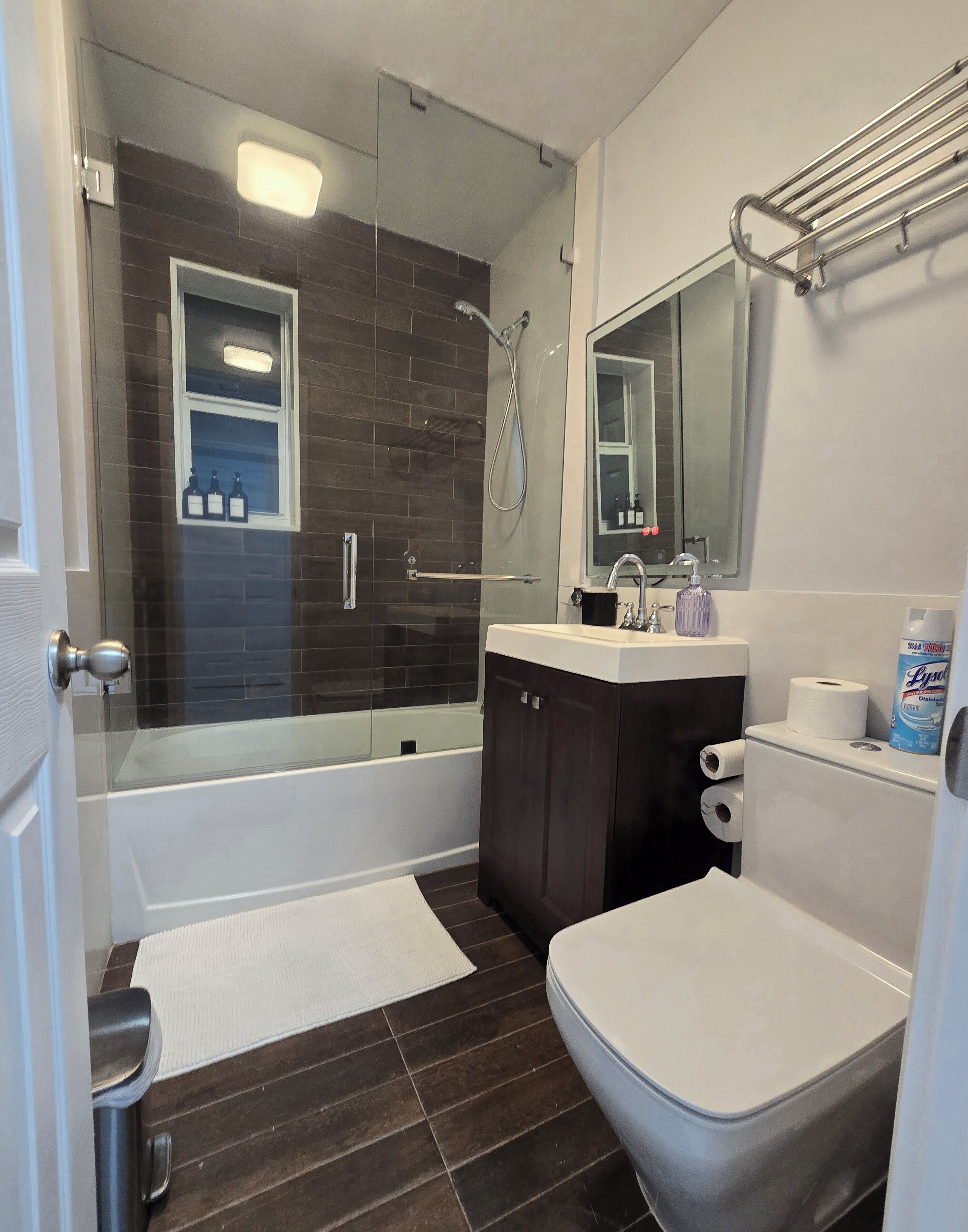 Shower, hair dryer, towels, shampoo