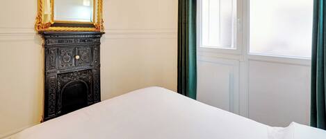 Apartment | Laptop workspace, iron/ironing board, bed sheets